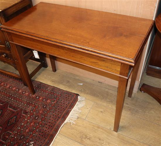 A George III mahogany rectangular folding top tea table W.91cm